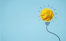 Ideas With Yellow Paper Crumpled Ball ( Lightbulb ).Creative Concept.