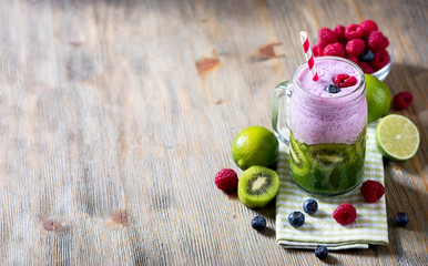 Wall Mural - Berry smoothie, healthy detox drink, diet or vegan food concept,