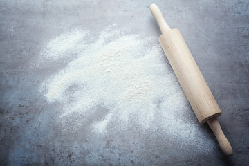 Canvas Print - Rolling pin and flour on table