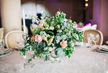 Wedding bouquet in a vase on the table