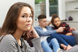Teenage Girl Jealous Of Young Couple At Home