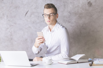 Poster - European businessman using smartphone