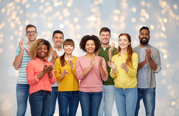 Wall Mural - international group of happy people applauding