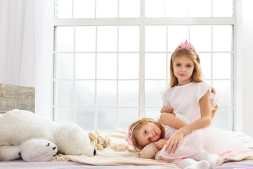 Wall Mural - Lovely two princesses relaxing at home