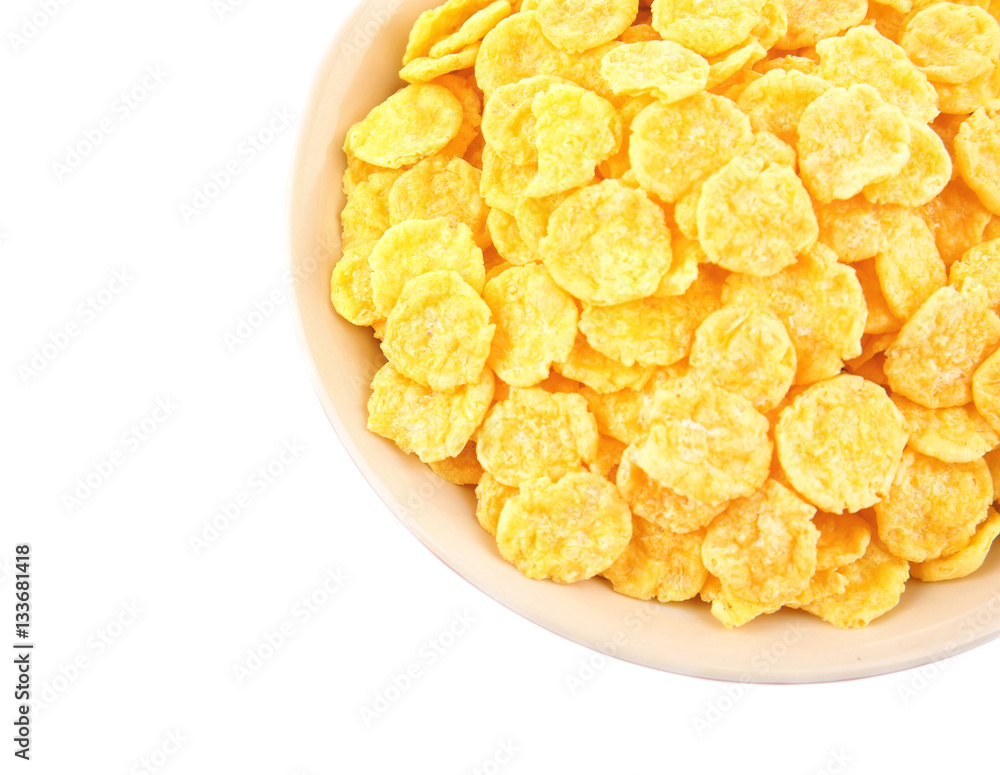 Bowl with cornflakes on white background