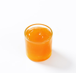 Wall Mural - glass of apricot jam