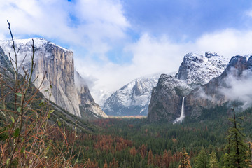 Wall Mural - El Capitan,Half Dome and Bridaveil Falls seen from Tunnel View between winter storms in Yosemite National Park