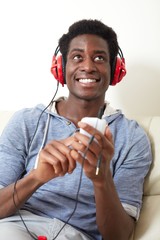 Canvas Print - Afro-american man listening music.