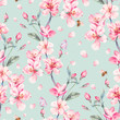 Watercolor spring seamless background with blooming branches