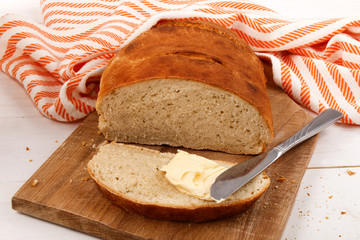 Wall Mural - freshly baked warm slice bread with irish butter