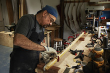 A Bowman, A Skilled Man Making A Bow, In His Workshop. 