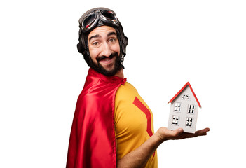 Wall Mural - crazy super hero with a house