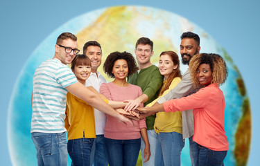 Wall Mural - international group of happy people holding hands