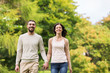© Syda Productions - happy couple walking in summer park