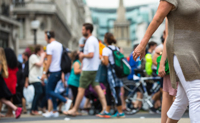 Poster - Regent street with lots of walking people crossing the road. Blurred image for background