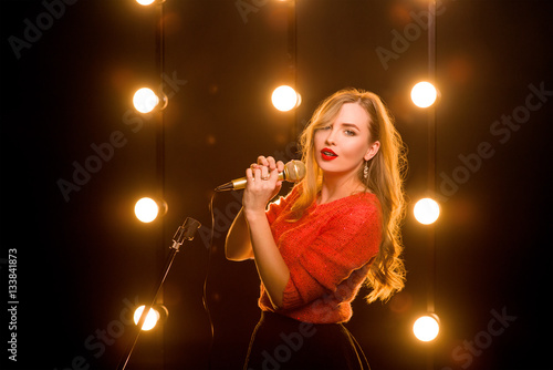 Young Smiley Beautiful Long Hair In Red Sweater Girl With