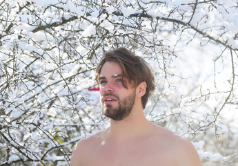 Canvas Print - happy muscular man in winter forest