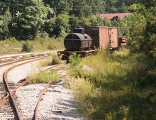 Old Rusty Abandoned Train Cars On Track Siding