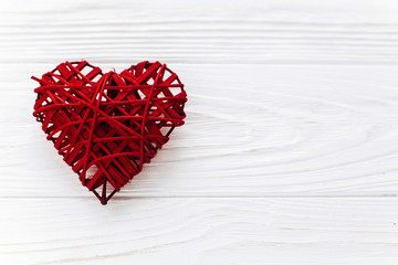 stylish red heart  flat lay on white wooden background. happy va