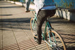 © ramonespelt - Casual young man riding his bicycle