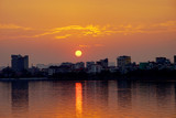 Fototapeta  - Sunset on West lake (Ho Tay), Hanoi