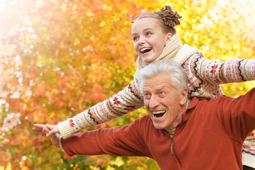 Canvas Print - Happy grandfather and granddaughter