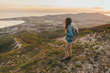 Canvas Print - Traveler walking at sunset