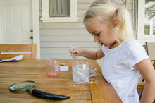 Young Girl Doing Science Experiment
