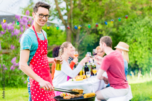 Familie Und Freunde Beim Grillen Auf Garten Party Buy This Stock Photo And Explore Similar Images At Adobe Stock Adobe Stock