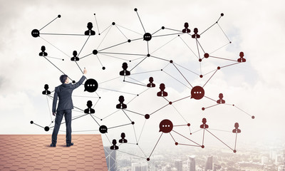 businessman on house roof presenting networking and connection c