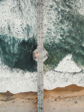 Overhead View Of People On Pier At Huntington Beach