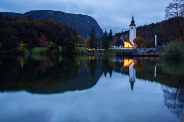 Canvas Print - Church tower and stone bridge at Lake Bohinj