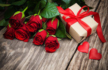 Red Roses And Gift Box