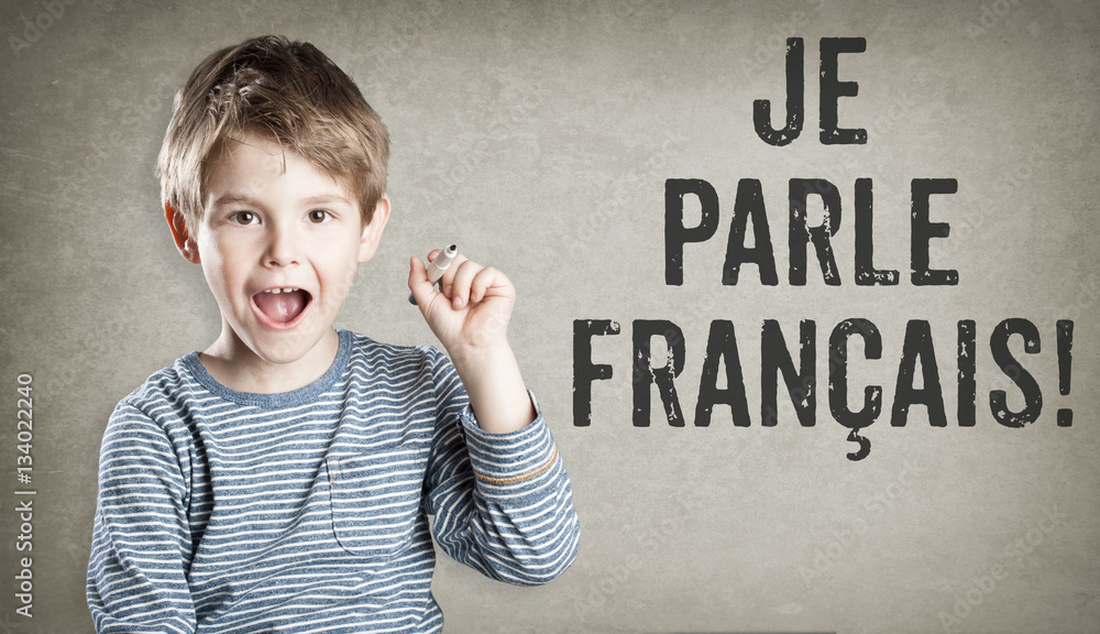 Photo Je parle Francais, I speak French, Boy on grunge background writ
