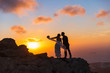 © Santorines - Silhouette of bride and groom on  sea sunset
