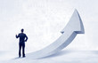 © ra2 studio - Financial businessman with arrow concept