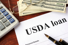 USDA Loan Form And Documents On A Table.