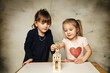 canvas print picture - Kinder bauen mit Bausteinen