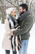 © nikodash - Loving couple enjoying the snow in the park
