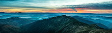Panorama With Blue Mountains And Hills At Sunset