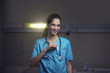 woman doctor or nurse is feeling satisfied while working night shift at the hospital