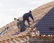 © schankz - workers working on the roof
