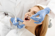 © Yakobchuk Olena - Dentist examining teeth of client