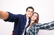 © F8  \ Suport Ukraine - Young couple take selfie on white background