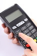 © ratmaner - Using payment terminal, enter personal identification number