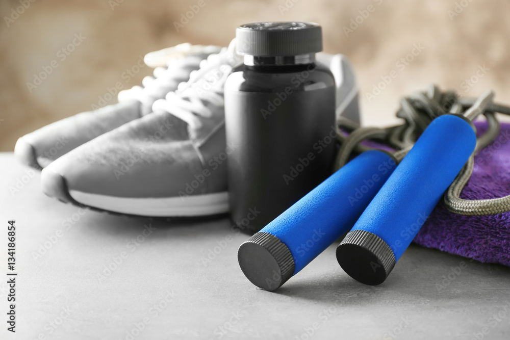 Sports concept. Workout objects on grey background