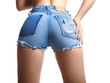 Sexy woman in fashion blue jeans shorts. Perfect hot booty and erotic curves hips