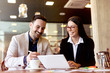 © Dusan Petkovic - Two young businessman having a successful meeting at restaurant.
