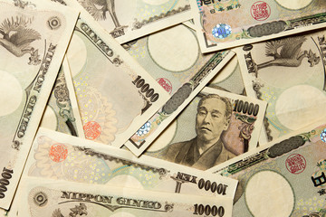 Sticker - Group of Japanese bank note 10000 yen background