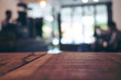 © Farknot Architect - Wooden table in cafe with blur bokeh vintage backgroud